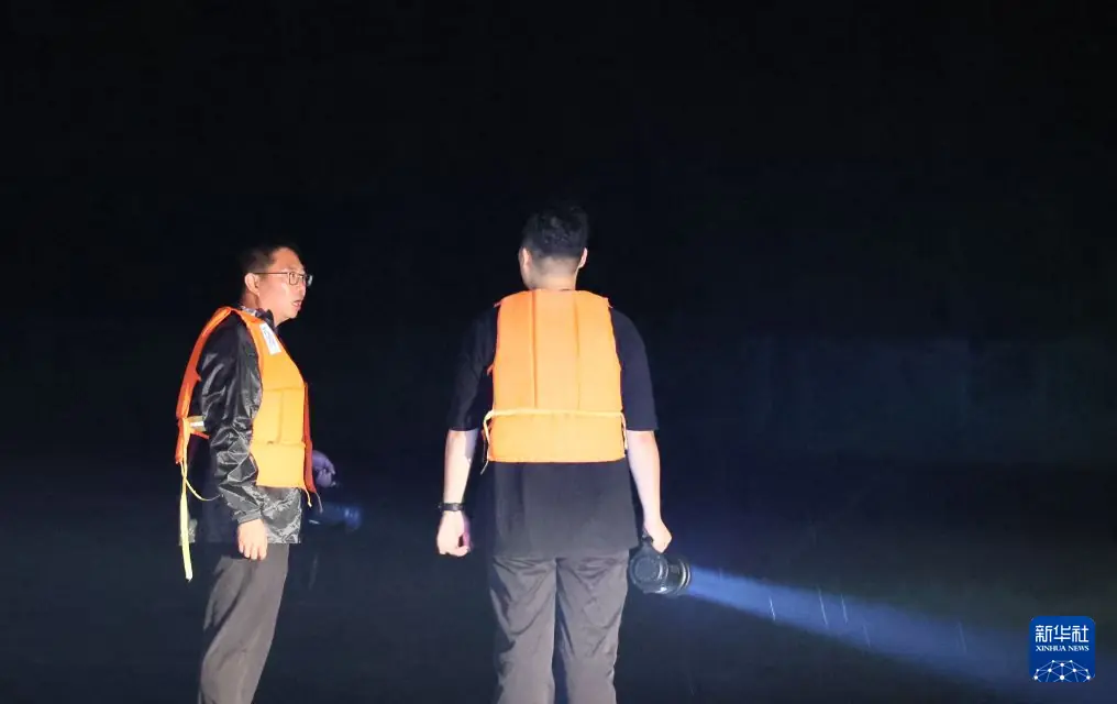 基层一线党旗红丨闻汛而动守闸坝